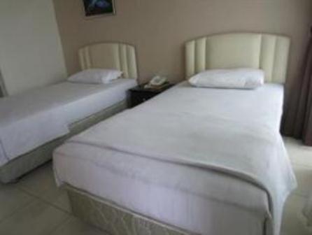 Mendu Inn Kuching Szoba fotó